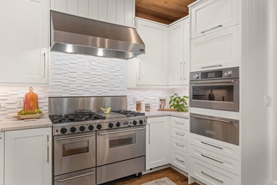 Experience luxury lakefront living in this custom-designed home - photo 24