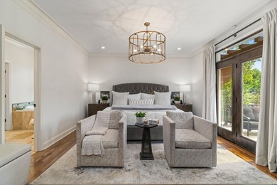 Experience luxury lakefront living in this custom-designed home - photo 25