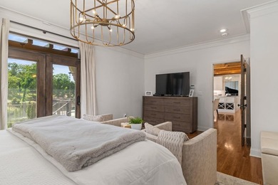 Experience luxury lakefront living in this custom-designed home - photo 27