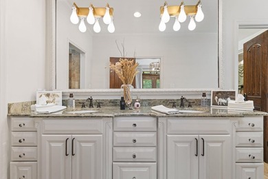 Experience luxury lakefront living in this custom-designed home - photo 29