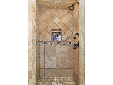 Experience luxury lakefront living in this custom-designed home - photo 31