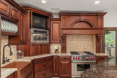 Experience luxury lakefront living in this custom-designed home - photo 56