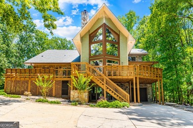 Follow the winding paved driveway through a canopy of mature - photo 1