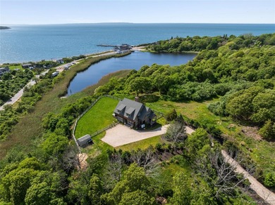 Elegant Montauk Retreat With Sunset Water Views. Privately set - photo 1