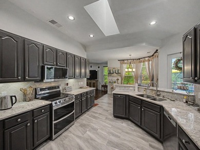 Welcome to this beautifully updated 4-bedroom, 2.5-bath pool - photo 14