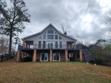 Lake Home For Sale in Carriere, Mississippi