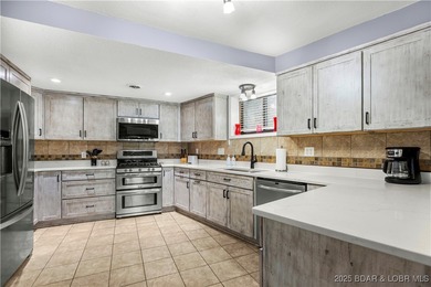 Welcome to your dream lakefront retreat in the Lake of the