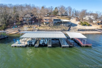 Welcome to your dream lakefront retreat in the Lake of the