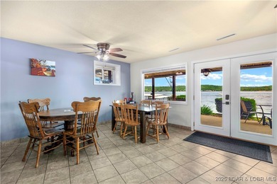 Welcome to your dream lakefront retreat in the Lake of the