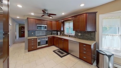 This stately residence is situated on a private street, north of - photo 11