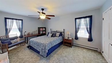 This stately residence is situated on a private street, north of - photo 18