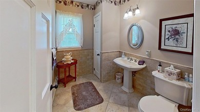 This stately residence is situated on a private street, north of - photo 20