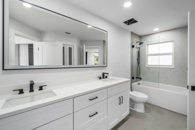 Completely renovated, this beautifully reimagined residence - photo 28