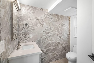 Completely renovated, this beautifully reimagined residence - photo 32