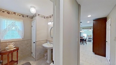 This stately residence is situated on a private street, north of - photo 34