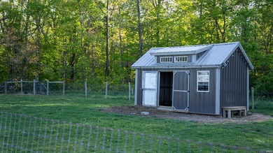 This exceptional Boone County property features a custom-built - photo 36