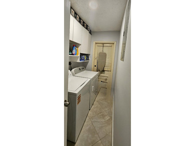 Welcome to this charming two-bedroom, two-bathroom villa in the - photo 14