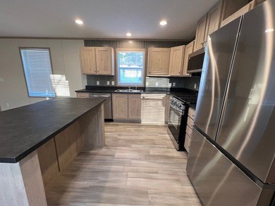 Welcome to Riverside Estates, a professionally managed - photo 6