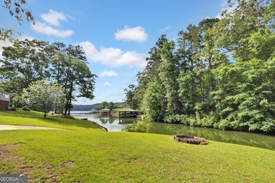 This custom-built full-time lake residence on Jackson Lake is an - photo 9