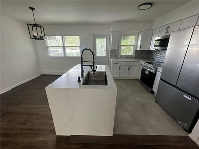 ISLIP School District. This split-level Newly Renovated Home has - photo 9