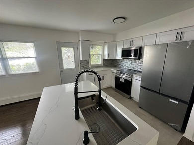ISLIP School District. This split-level Newly Renovated Home has - photo 10