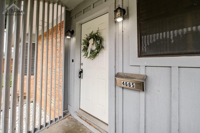 This spacious 4-bedroom, 2-bathroom home offers a warm and - photo 2