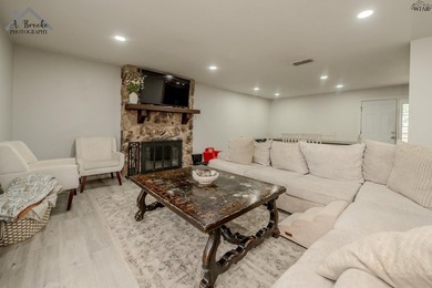This spacious 4-bedroom, 2-bathroom home offers a warm and - photo 5