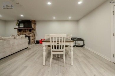 This spacious 4-bedroom, 2-bathroom home offers a warm and - photo 8