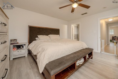 This spacious 4-bedroom, 2-bathroom home offers a warm and - photo 10