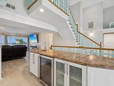 Nestled on a private, direct waterfront lot in Gulf Harbors - photo 18