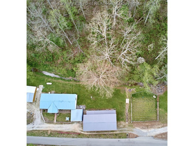 Situated on two acres in rural Milton, this 1996 double-wide - photo 2