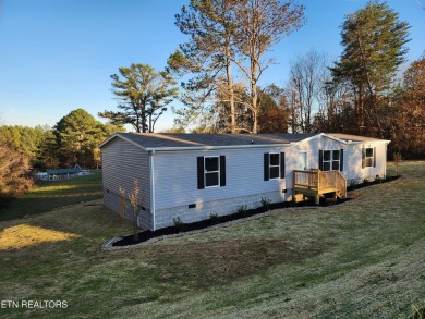 This new Champion Grand Home is 1800sqft and boasts 4 bedrooms - Lake Home For Sale in Spring City, Tennessee