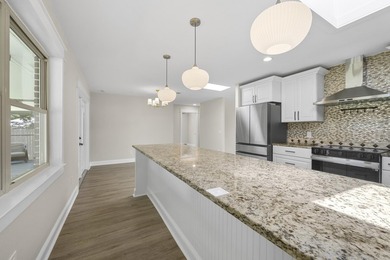 This impeccably renovated home is ready to move in! From the - photo 5