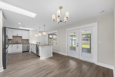 This impeccably renovated home is ready to move in! From the - photo 7