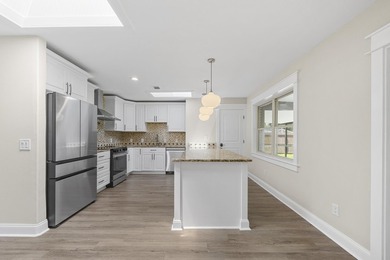 This impeccably renovated home is ready to move in! From the - photo 8