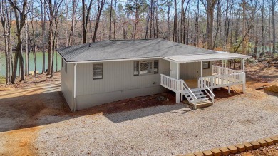 Adorable 2 bedroom 2 bath cottage on the lake with a dock.  A - Lake Home Sale Pending in Seneca, South Carolina