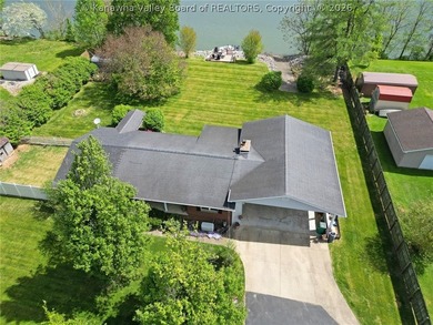 Welcome to riverfront living at its finest, where luxury - photo 7