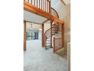 Tucked within the gated, pine-lined community of The Villages II