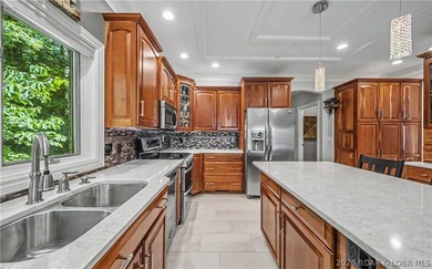 Welcome to refined luxury living in the prestigious Porto Cima - photo 17