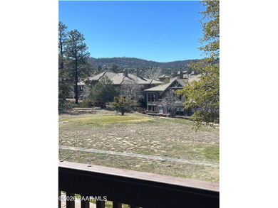 Tucked within the gated, pine-lined community of The Villages II