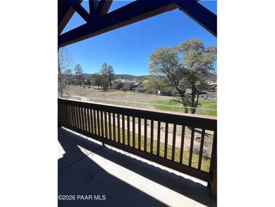 Tucked within the gated, pine-lined community of The Villages II