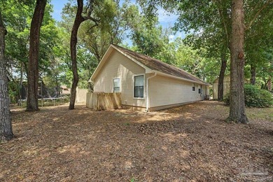 Charming 3-bedroom, 2-bath home tucked beneath a canopy of - photo 3