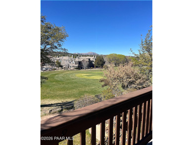 Tucked within the gated, pine-lined community of The Villages II