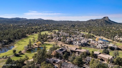 Tucked within the gated, pine-lined community of The Villages II