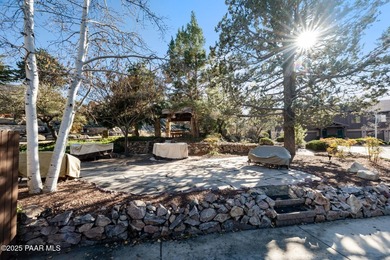 Tucked within the gated, pine-lined community of The Villages II