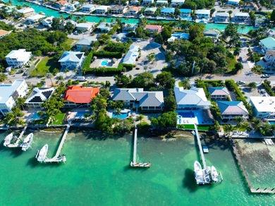 First time ever offered, this extraordinary open-water estate - photo 35