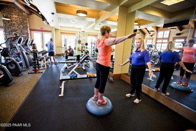 Tucked within the gated, pine-lined community of The Villages II