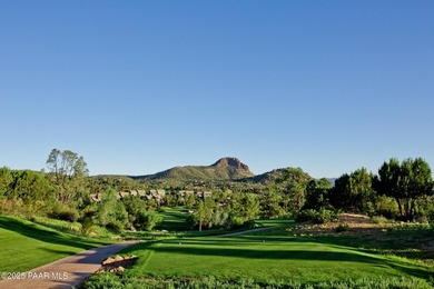 Tucked within the gated, pine-lined community of The Villages II