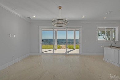 Few homes capture waterfront living like this. Behind the gates - photo 9