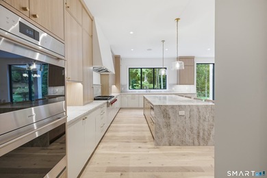 Resort-style living meets modern luxury at 2 Windy Hill Road - photo 10
